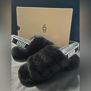 COPY - I am selling black fur UGG slides. They have never been worn.